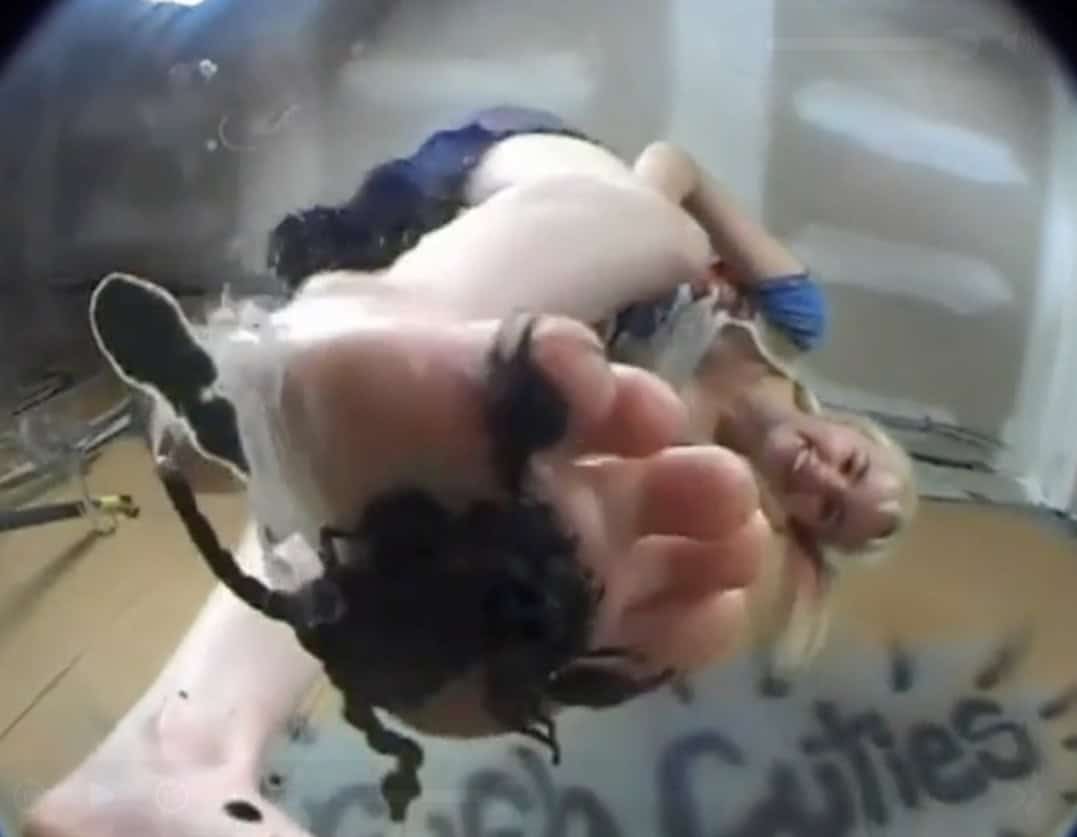 barefoot girl smashing scorpion